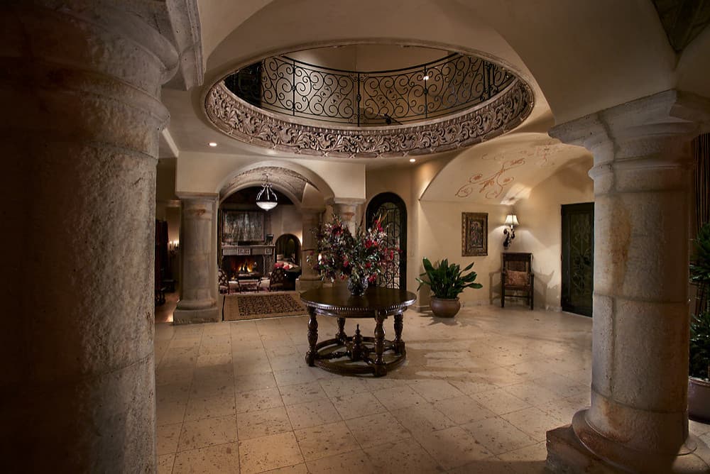 Finished stone arches and columns in a foyer